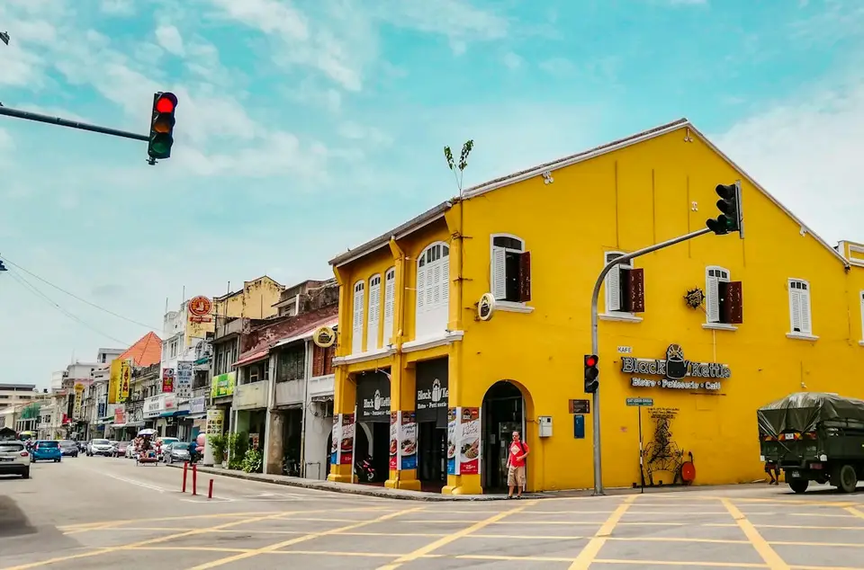 A yellow colonial shophouse in George Town, Penang